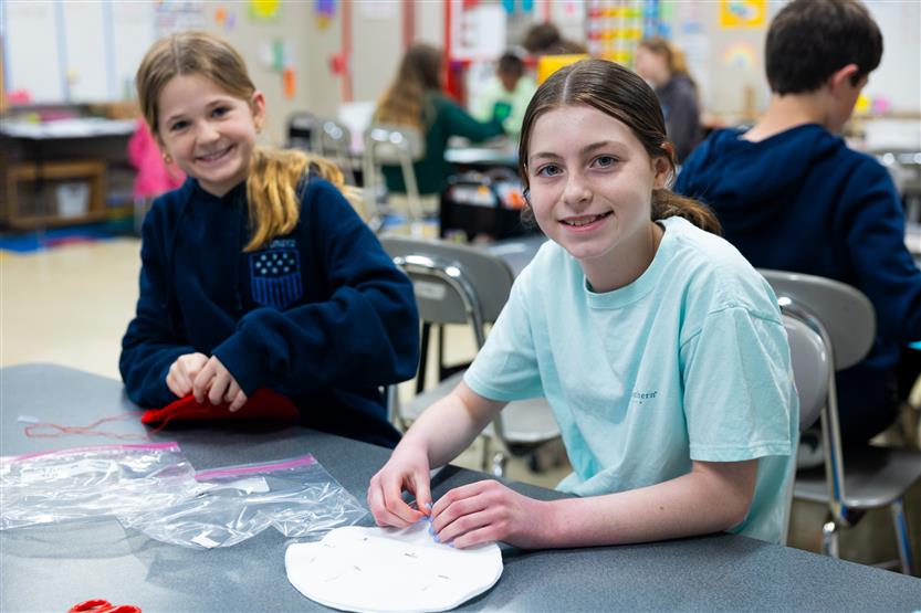 Fifth graders at Pearre Creek learn how to sew